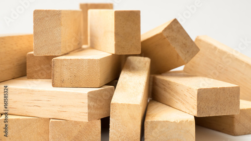 Wooden Blocks disrupted close up on white background