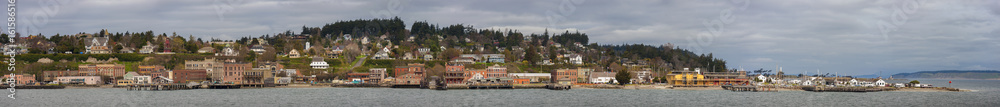 Port Townsend Waterfront Panorama. Located near the Strait of Juan de Fuca and the site of a safe harbor, Port Townsend became an important shipping port in the late 1800s. Victorians are everywhere.