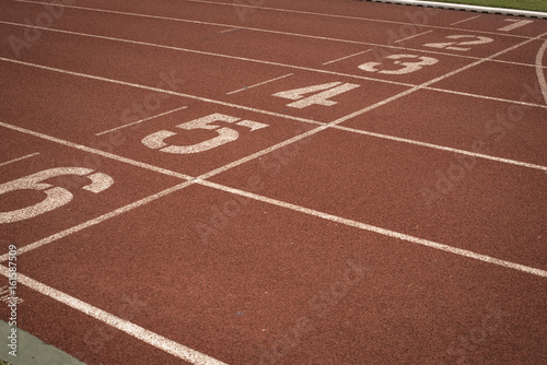 Running track with number the path to success.