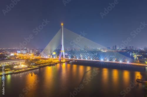 Fototapeta Naklejka Na Ścianę i Meble -  The Rama VIII Bridge is a cable-stayed bridge crossing the Chao Phraya River in Bangkok, Thailand.