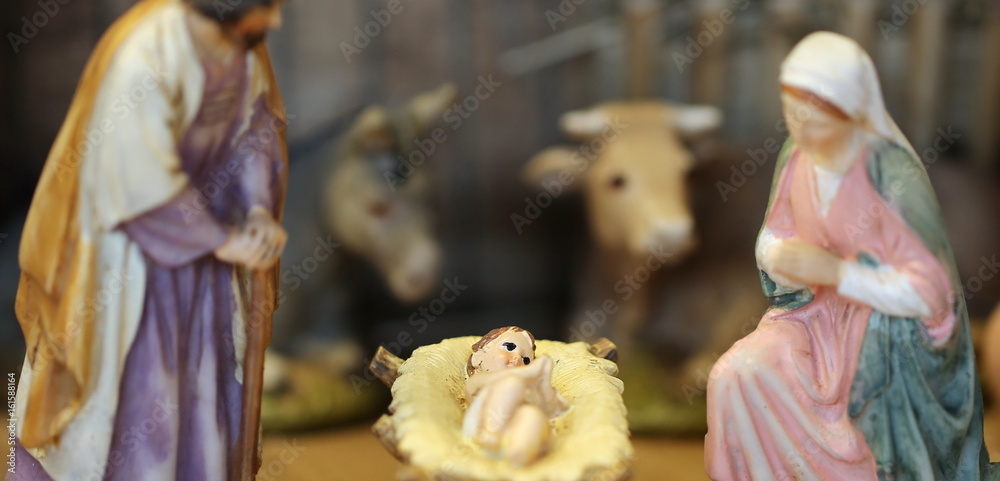 baby Jesus in the manger and the rest is intentionally blurred t