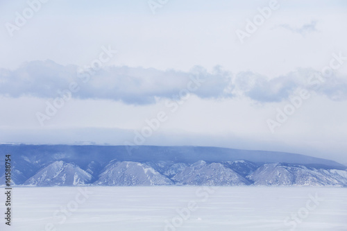 Winter Baikal lake landscape. Mountain peaks