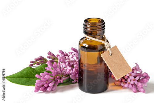Relaxing essential oil  fresh flowers  relaxation. Isolated on a white background.