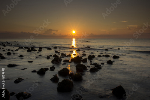 sunrise at the beach © Yie