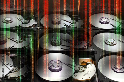 Open Hard Drive Disk aligned with green and red postproduction effetcs. background. photo