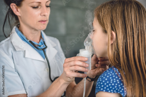 Little girl having nebulizer treatments