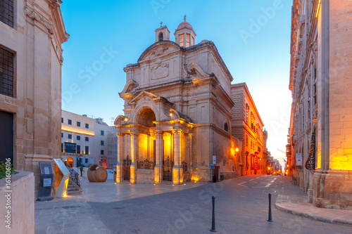 The Roman Catholic Church of St Catherine of Alexandria or St Catherine of Italy during morning blue hour, Valletta, Malta © Kavalenkava