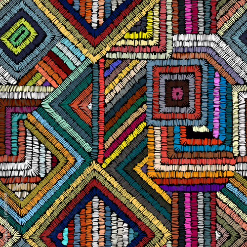Embroidery - seamless ornament. Colored lines on a black background. Handmade. Ethnic and tribal motifs. Print in the bohemian style.