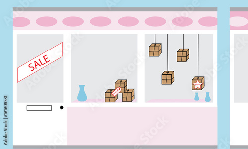 pink and blue shop front showing window display with sale going on.