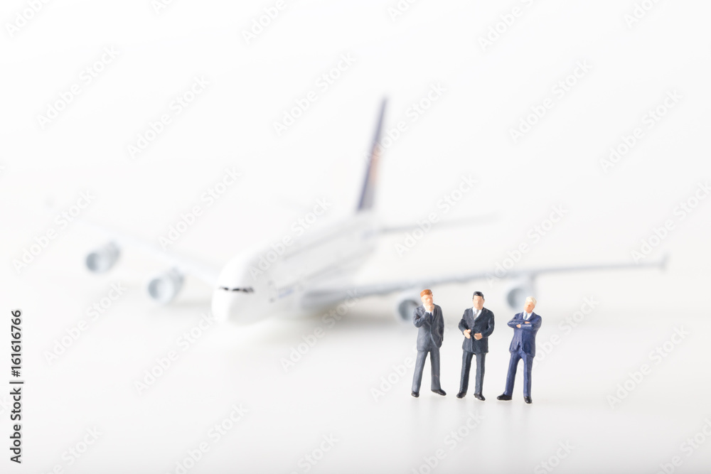 miniature model group of airline investment standing together isolated on white background. miniature model group of airline investment standing together isolated on white background.