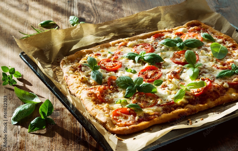 Italienische Pizza vom Blech Stock Photo | Adobe Stock