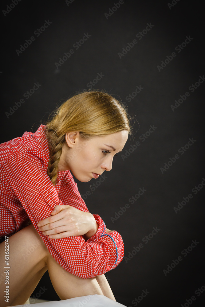 Sad depressed young woman in bed Sad depressed young woman in bed