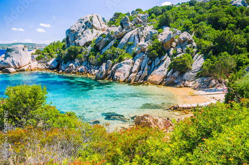 Cute bay surrounded by sand rocks near Porto Rafael, Palau, Sardinia, Italy photo