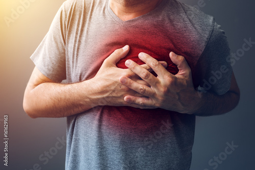 Adult male with heart burn condition photo