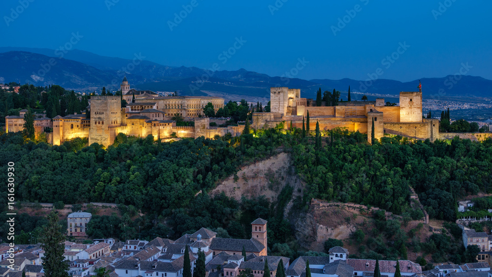 Ancient arabic fortress of Alhambra at sunset. Granada, Spain.