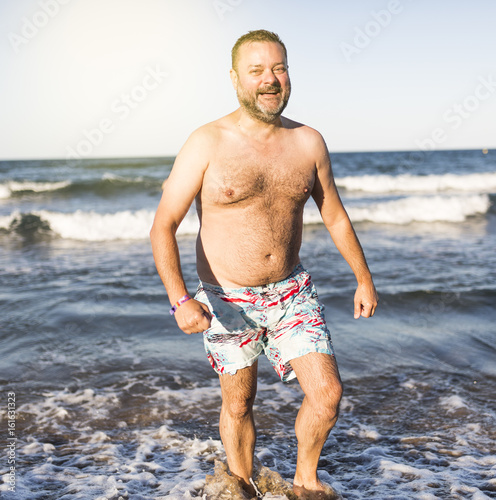 Happy man on the beach