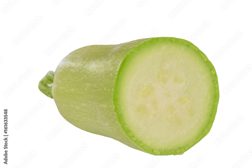 One slice of a zucchini cut in half One slice of a zucchini cut in half
