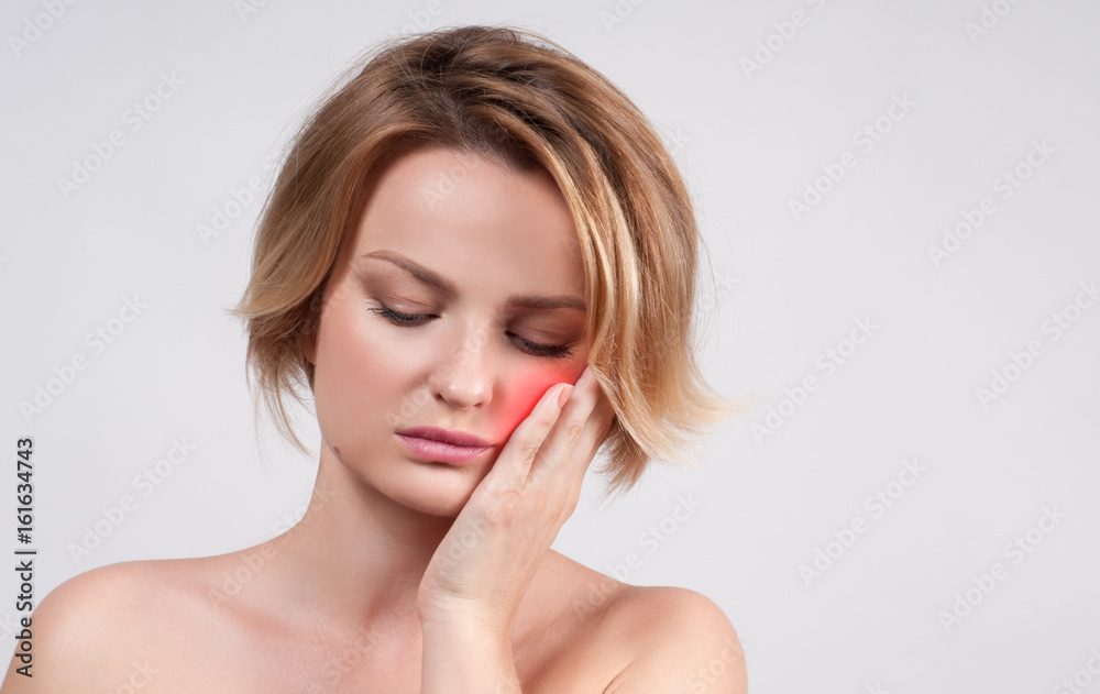 Closeup of woman suffering from toothache Closeup of woman suffering from toothache