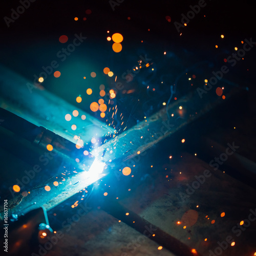 artistic welding sparks light, industrial background