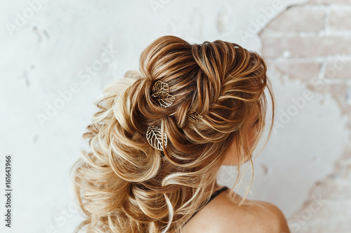 Quadro su tela Close up detail of greek braid hairstyle, back rear view at hairdresser salon