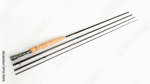 A fly fishing rod on a white background.
