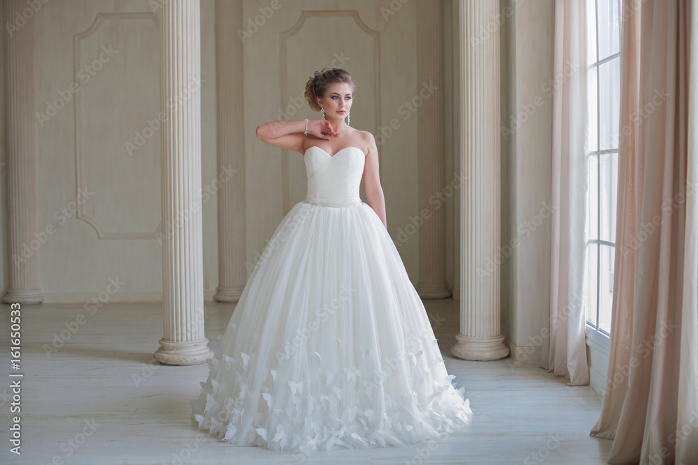 portrait of beautiful blonde bride with fashion hairstyle and make-up portrait of beautiful blonde bride with fashion hairstyle and make-up