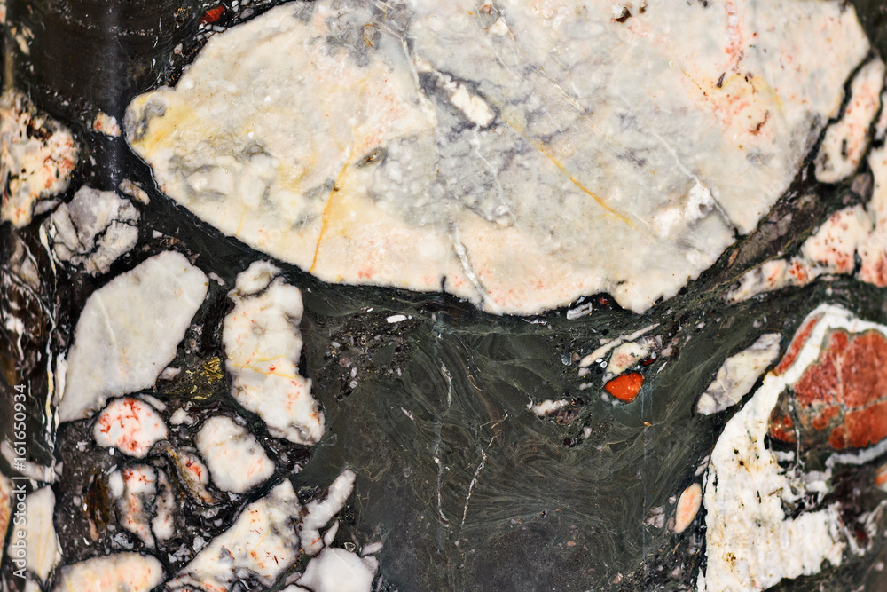 Background marble of different colors from yellow to white Background marble of different colors from yellow to white
