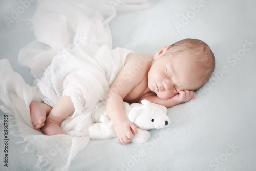 Two weeks old baby to sleep with teddy bear