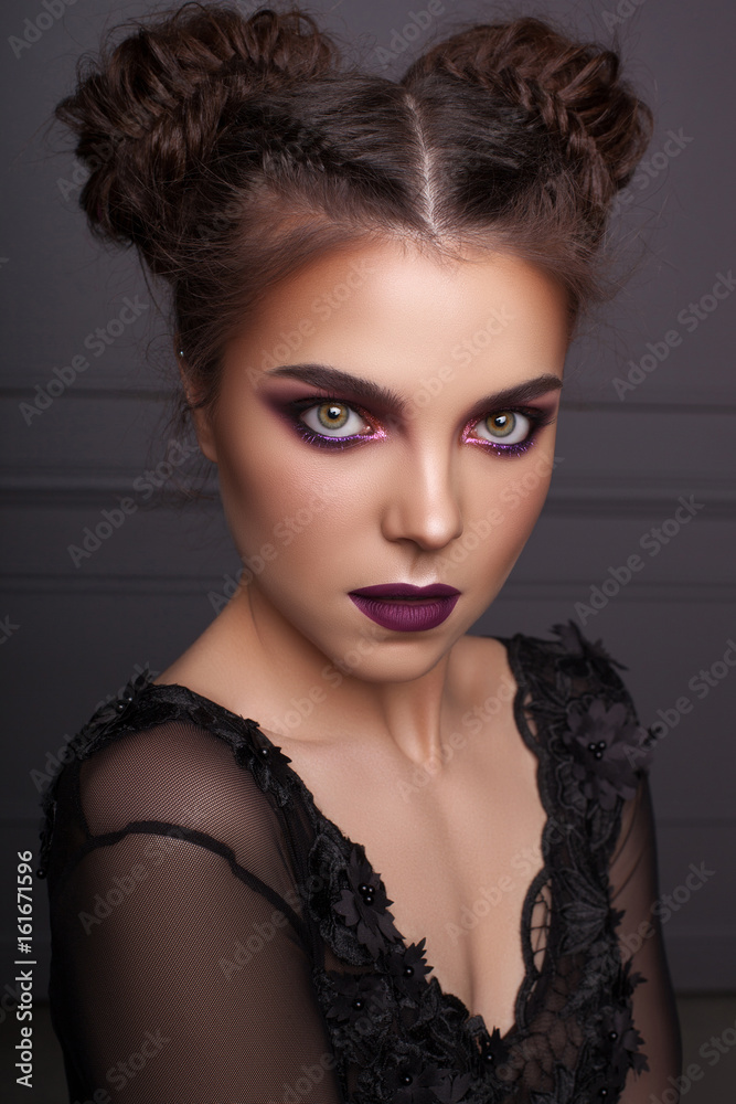 Fototapeta premium portrait of beautiful woman with trendy fashion makeup and hairstyle
