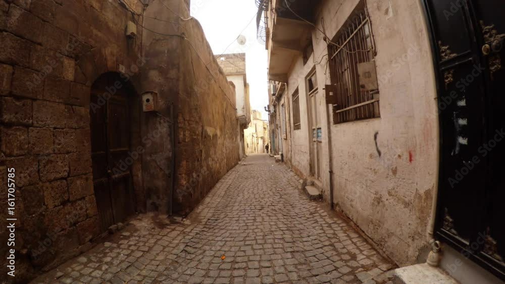Ancient Paved Street Barred Window Old and Modern Doors in Sanliurfa Ancient Paved Street Barred Window Old and Modern Doors in Sanliurfa