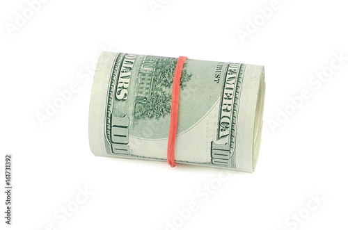 roll of hundred USA dollar bills with red rubber