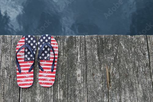 Flag flip flops on dock