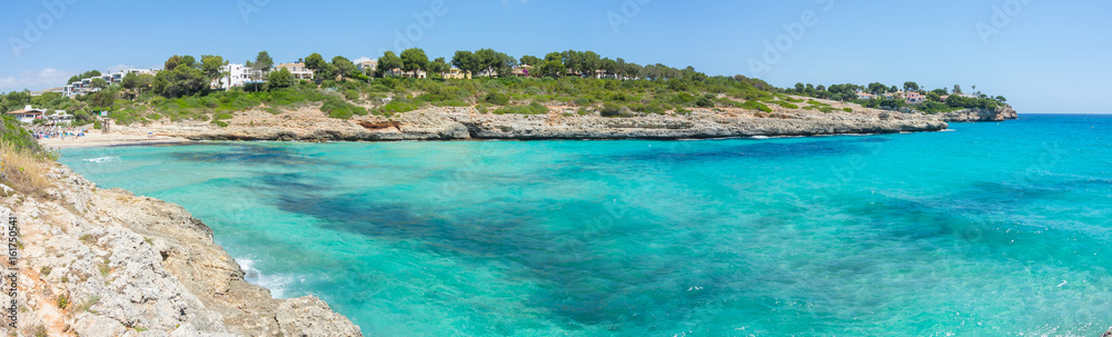 Landscape of the beautiful bay of Cala Mandia with a wonderful turquoise sea, Porto Cristo, Majorca, Spain  