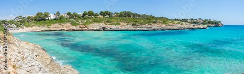 Landscape of the beautiful bay of Cala Mandia with a wonderful turquoise sea, Porto Cristo, Majorca, Spain 
