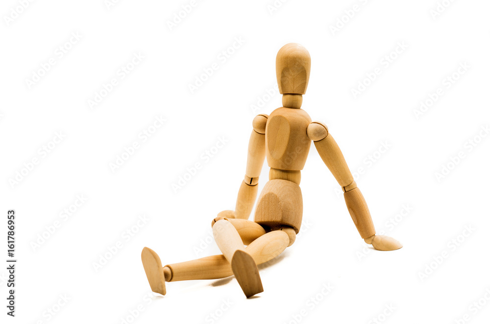 wooden man puppet sitting on white background wooden man puppet sitting on white background