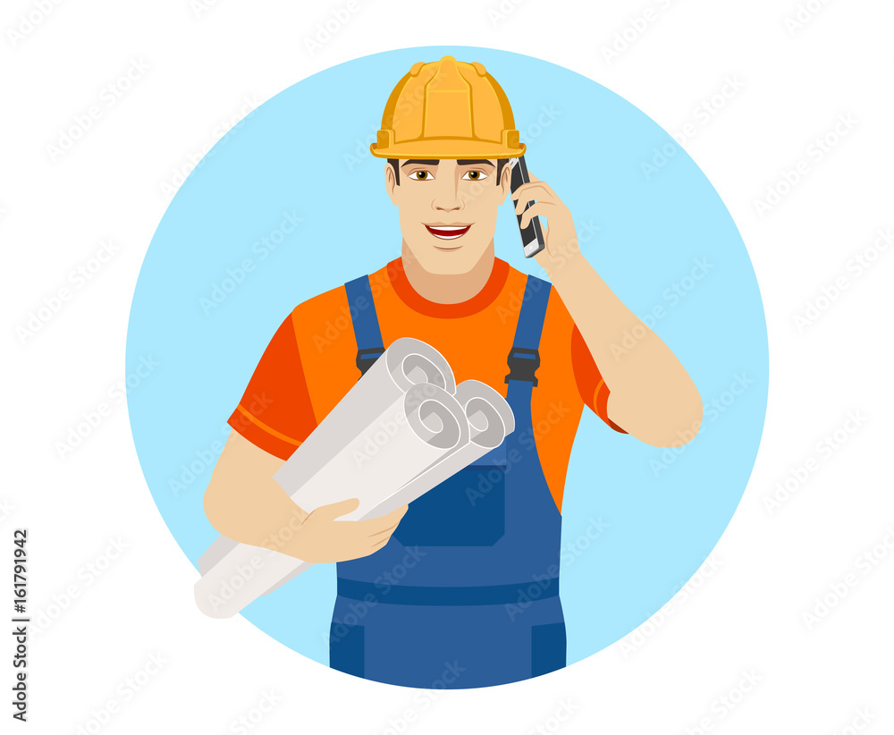 Builder holding the project plans and talking on the mobile phone Builder holding the project plans and talking on the mobile phone