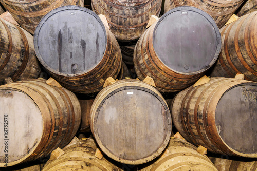 Background of old oak barrels © dimbar76