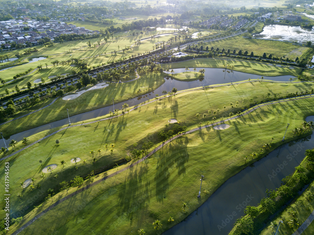 Aerial view of the green golf course in Thailand.