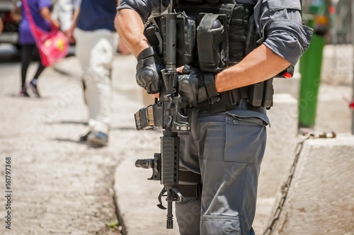 JERUSALEM, ISRAEL. June 20, 2017. Armed with an M-16 Israel border police officer on guard at the terror attack site by the Damascus gate of the Old city of Jerusalem. Security measures stock image.