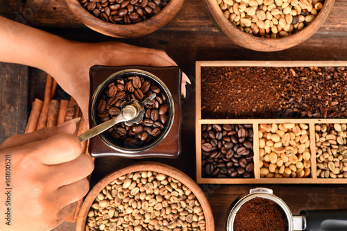 Freshly coffee beans in bowl  and coffee beans in coffee grinder for background