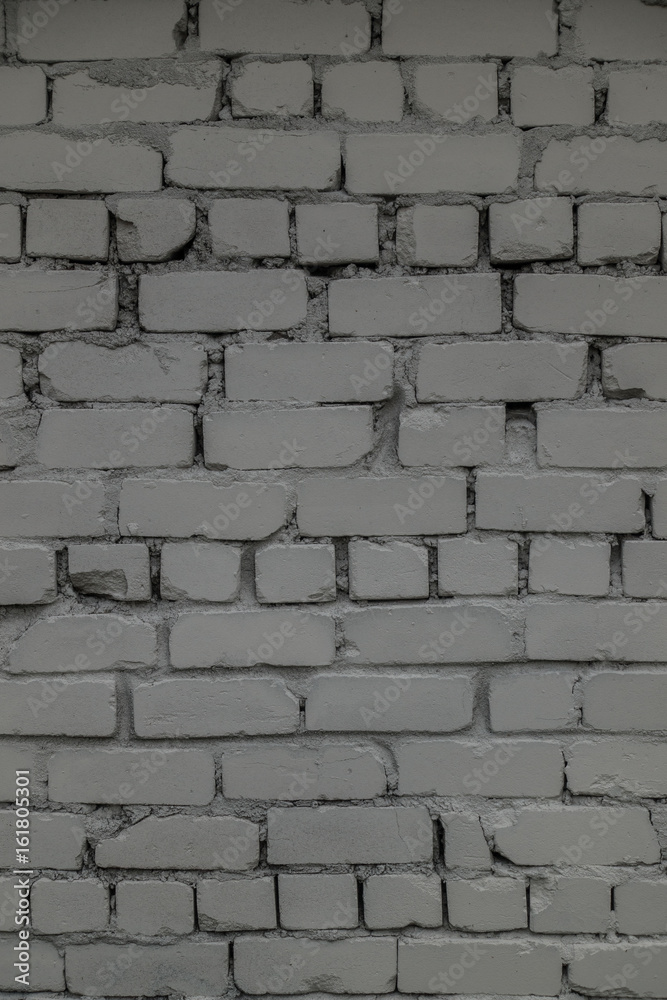 Fototapeta premium The old brick and stone wall with plaster