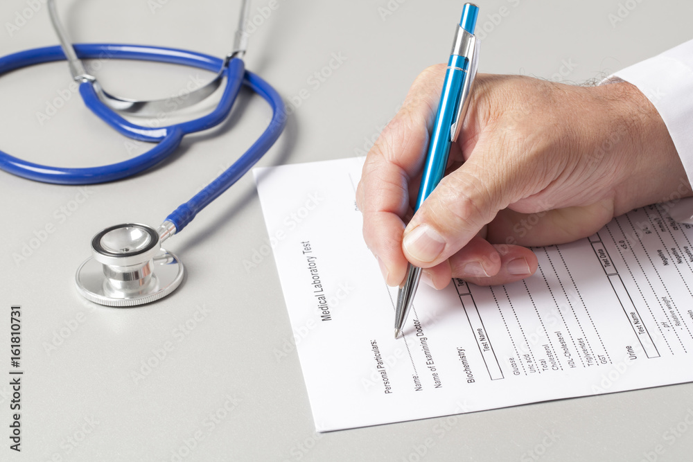 Doctor Filling Out Medical Form Doctor Filling Out Medical Form