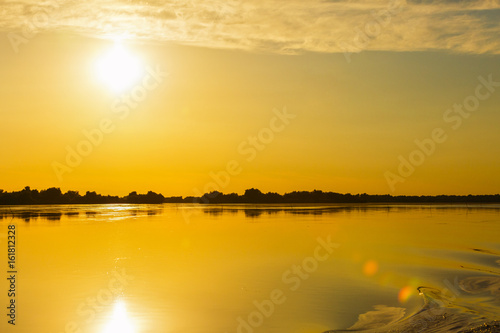 Beautiful scenery with a golden sunset in the Danube Delta