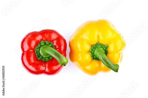 Sweet red and yellow pepper or paprika isolated on white background. Top view. © dizelen