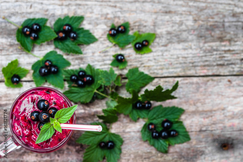 Fototapeta Naklejka Na Ścianę i Meble -  Healthy smoothie from fruits with yogurt. Blended berry of black