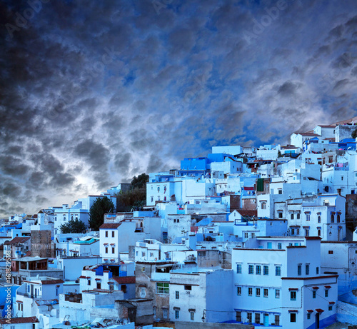 Panorama of Chefchaouen Blue Medina at sunset in Morocco, Africa photo