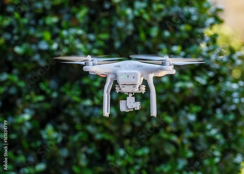 white drone in flight