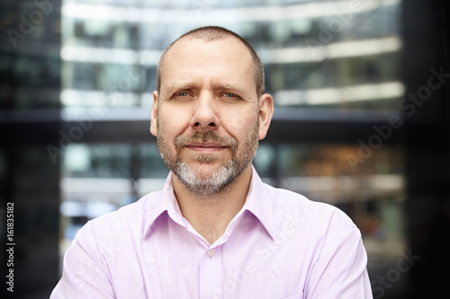 Portrait of positive businessman