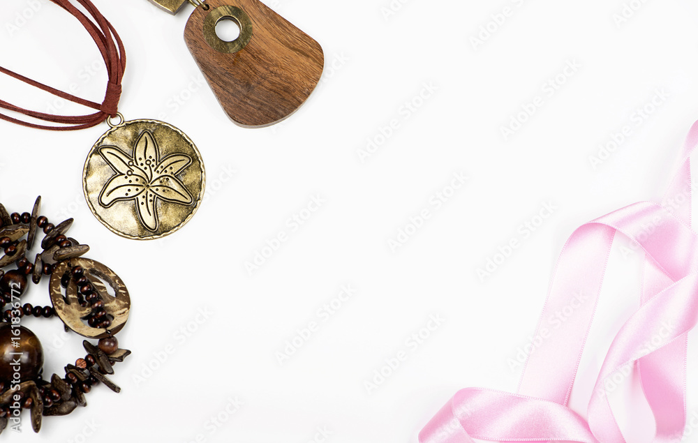 Fototapeta premium Artistic pendants on white background. Copy space.