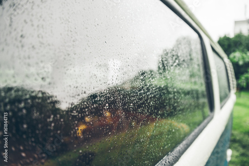 van window outside in rain drops photo